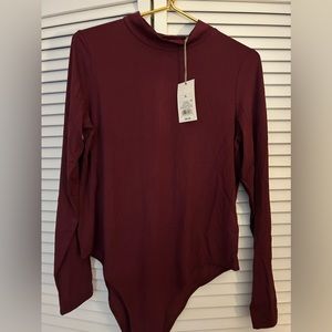 Set of 2 woman’s turtleneck bodysuits size Xl